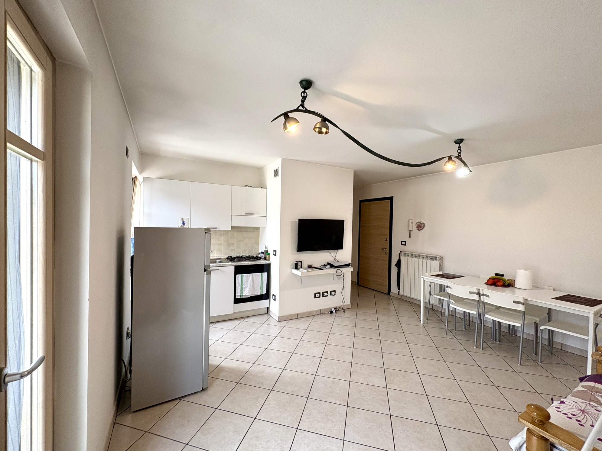 Bilocale con terrazzo e rendita garantita – Piancogno centro